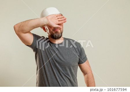 The guy shows different gestures with his hands 101677594