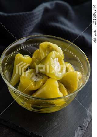 Peppers stuffed with cream cheese in bowl. Peppers stuffed with cream cheese in bowl. 101680244