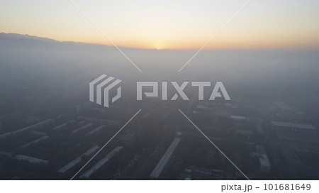 Epic gray smog is visible at sunset over the city 101681649