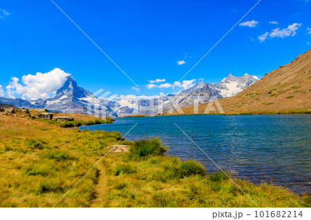 View of Stelli Lake (Stellisee) and Matterhorn mountain at summer in Zermatt, Swiss Alps, Switzerland View of Stelli Lake (Stellisee) and Matterhorn mountain at summer in Zermatt, Swiss Alps, Switzerland 101682214