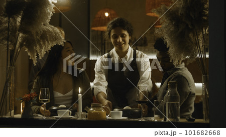 Multi ethnic couple in modern gastro cafe 101682668