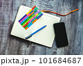 Dairy on the table with phone pen stickers 101684687