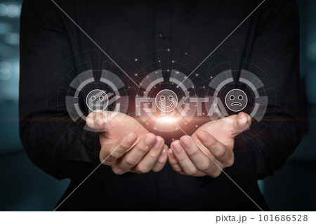 Businessman showing emoticons with emotions . Businessman showing emoticons with emotions . 101686528
