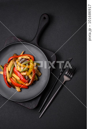 Delicious vegetables steamed peppers, asparagus beans and potatoes Delicious vegetables steamed peppers, asparagus beans and potatoes 101686917