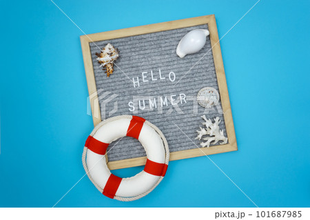 A message on a board that says hello summer 101687985