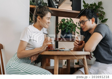 Sweet couple lover flirting date in the cafe. 101691218
