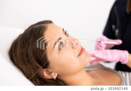 Young woman having mesotherapy procedure on her face 101692140