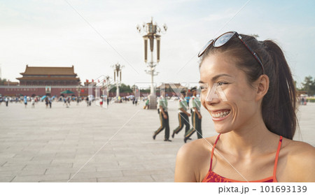 China tourist Asian woman walking at Tiananmen Square in Beijing, China. Summer travel destination China tourist Asian woman walking at Tiananmen Square in Beijing, China. Summer travel destination 101693139
