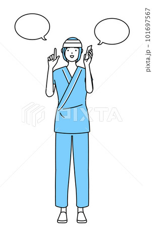 電話をしながら指さしをする頭に包帯を巻いた女性入院患者 101697567