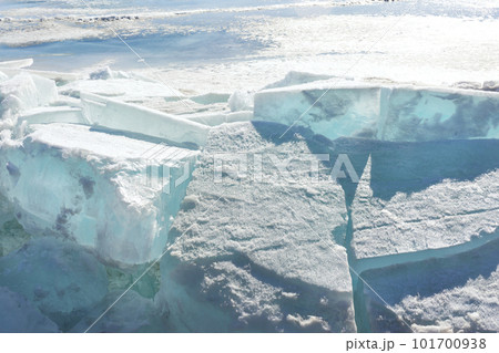 Blue Ice Clear Transparent Hummocks on the Frozen Lake 101700938