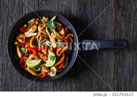 chicken fajitas with bell peppers, onion, spices chicken fajitas with bell peppers, onion, spices 101701625