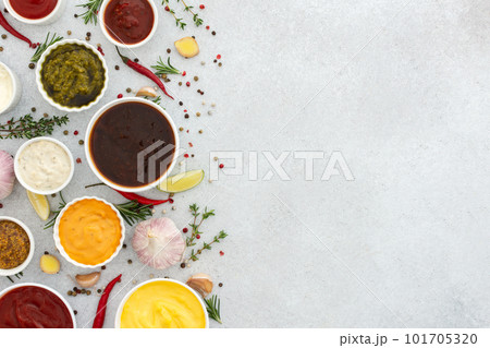 Different types of sauces in bowls 101705320