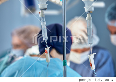 faces of surgeons in the operating room during the operation. Modern medicine, medical workers during a complex operation, modern medicine 101710013
