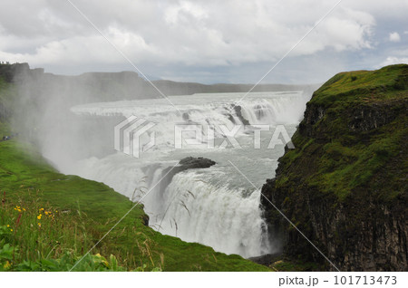 Aerial view of foamy Gullfoss Falls waterfall in the Hvita river in Iceland Aerial view of foamy Gullfoss Falls waterfall in the Hvita river in Iceland 101713473