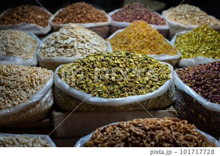 Bag of pistachios and nuts for sale on snack market, Suq 101717728