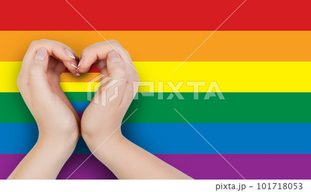 Female hand holding heart with LGBT flag Female hand holding heart with LGBT flag 101718053