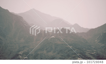 View of the Afghan mountains in fog 101728048