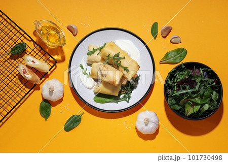 Concept of tasty food, thin pancakes with filling, top view Concept of tasty food, thin pancakes with filling, top view 101730498