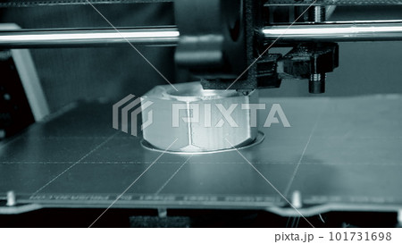 3D printer. Working 3d printer close-up. 3d printer printing object from molten plastic. Printing prototype. New modern printing technology on 3D printer. Additive progressive technologies. FDM 101731698