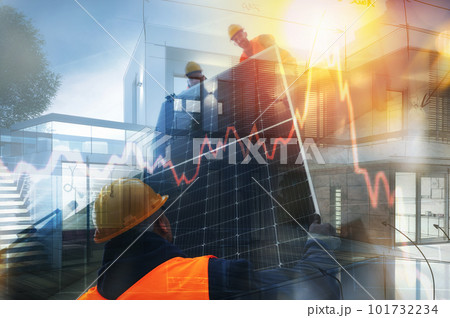 Qualified workers during the installation of photovoltaic systems 101732234