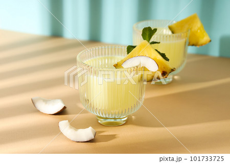 Fresh summer cocktail - Pina colada, fresh summer drink concept Fresh summer cocktail - Pina colada, fresh summer drink concept 101733725