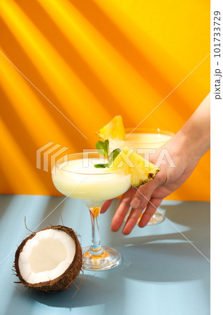 Fresh summer cocktail - Pina colada, fresh summer drink concept Fresh summer cocktail - Pina colada, fresh summer drink concept 101733729