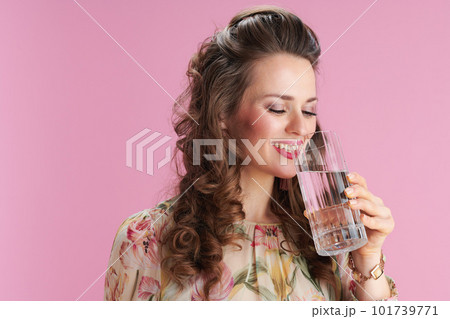 happy trendy woman with long wavy brunette hair on pink happy trendy woman with long wavy brunette hair on pink 101739771
