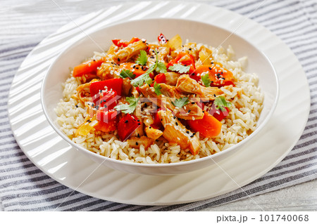 sweet and sour chicken with veggies and rice 101740068