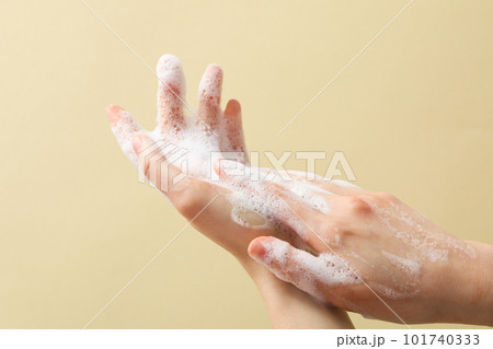 Hands with foam, spa, beauty procedures and skin care concept Hands with foam, spa, beauty procedures and skin care concept 101740333