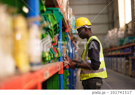 Industrial worker working at warehose factory. Industrial worker working at warehose factory. 101741517