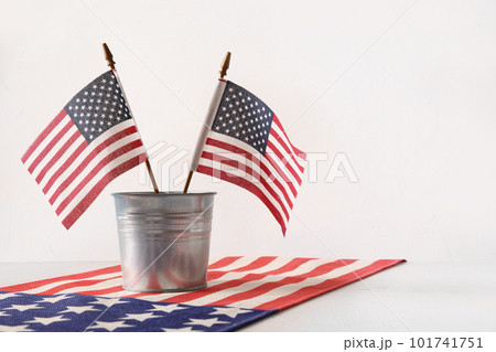 American flags in metal decorative bucket. USA Independence Day. American flags in metal decorative bucket. USA Independence Day. 101741751