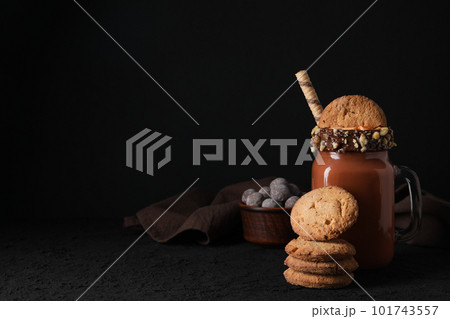 Tasty fresh summer dessert - chocolate milkshake, space for text Tasty fresh summer dessert - chocolate milkshake, space for text 101743557