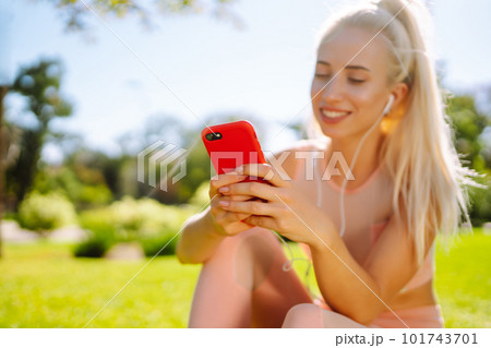 Young yoga woman enjoy listening to music with headphone with feeling happy and relaxed. 101743701