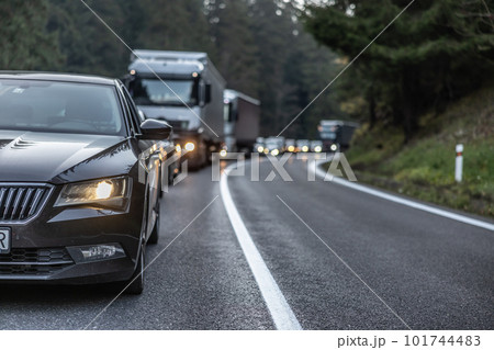 Traffic jam on a mountain road after several vehicles collided in front Traffic jam on a mountain road after several vehicles collided in front 101744483