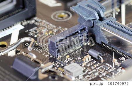 close up PCIe M.2 connector interface for modern high performance ssd storage on the modern computer. close up PCIe M.2 connector interface for modern high performance ssd storage on the modern computer. 101749973