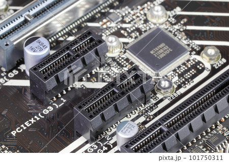 close-up Computer mainboard with pcie x1 and x16 slot on computer mainboard close-up Computer mainboard with pcie x1 and x16 slot on computer mainboard 101750311