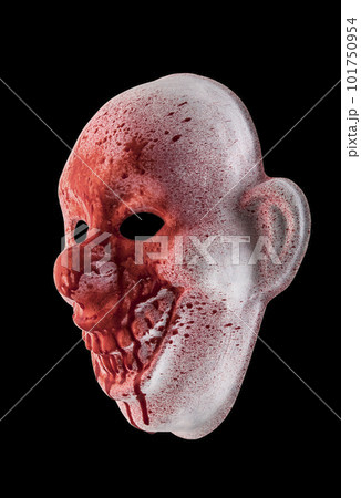 Scary clown halloween mask in blood isolated on black background with clipping path Scary clown halloween mask in blood isolated on black background with clipping path 101750954