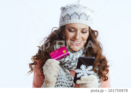 smiling woman on making online shopping on e-commerce website 101750978