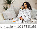 Young beautiful woman being treated at home. 101756169