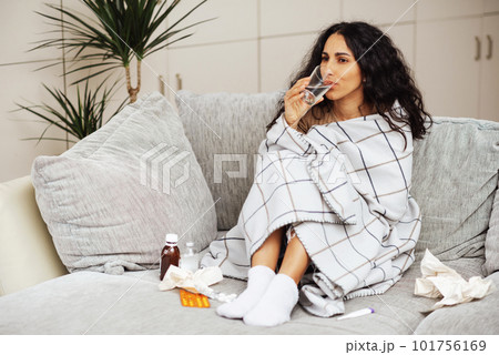 Young beautiful woman being treated at home. Young beautiful woman being treated at home. 101756169