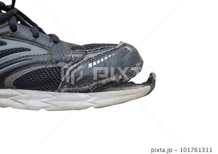 side view broken old black canvas shoes isolated on white background with clipping path side view broken old black canvas shoes isolated on white background with clipping path 101761311