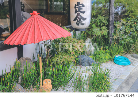 traditional red umbrella in garden for green tea ceremony 101767144