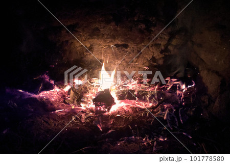 Fire burning in a fireplace Fire burning in a fireplace 101778580