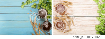 glass of foamy beer with hop cones and wheat on blue wooden background. Top view with copy space for your text 101780649