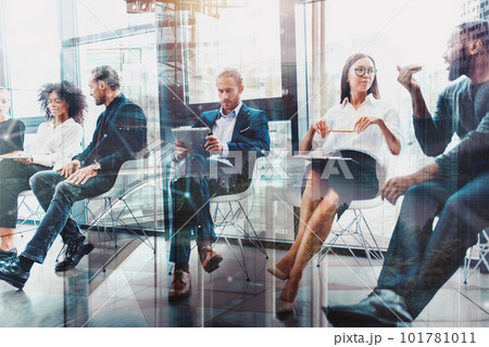 Business people that work together in office. Concept of teamwork and partnership Business people that work together in office. Concept of teamwork and partnership 101781011
