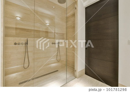 a walk in shower that is very clean and ready for you to use it as an additional room or bathroom 101781298