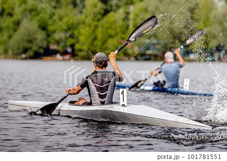 two male athlete kayaker on kayak single rowing kayaking championship race, sports summer games two male athlete kayaker on kayak single rowing kayaking championship race, sports summer games 101781551