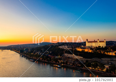 View of Bratislava castle, old town and the Danube river from observation deck the bridge in Bratislava, Slovakia at night 101782001