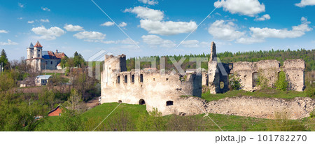 Spring view of Sydoriv Castle ruins (built in 1640s) and Katolitsky church (built in 1730-1741). Sydoriv village, located 7 km south of Husiatyn, Ternopil region, Ukraine. Spring view of Sydoriv Castle ruins (built in 1640s) and Katolitsky church (built in 1730-1741). Sydoriv village, located 7 km south of Husiatyn, Ternopil region, Ukraine. 101782270