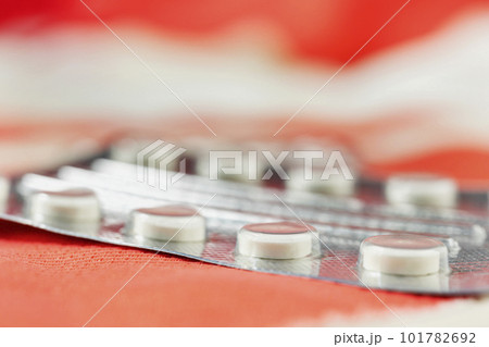 White medicine pills in blister pack 101782692